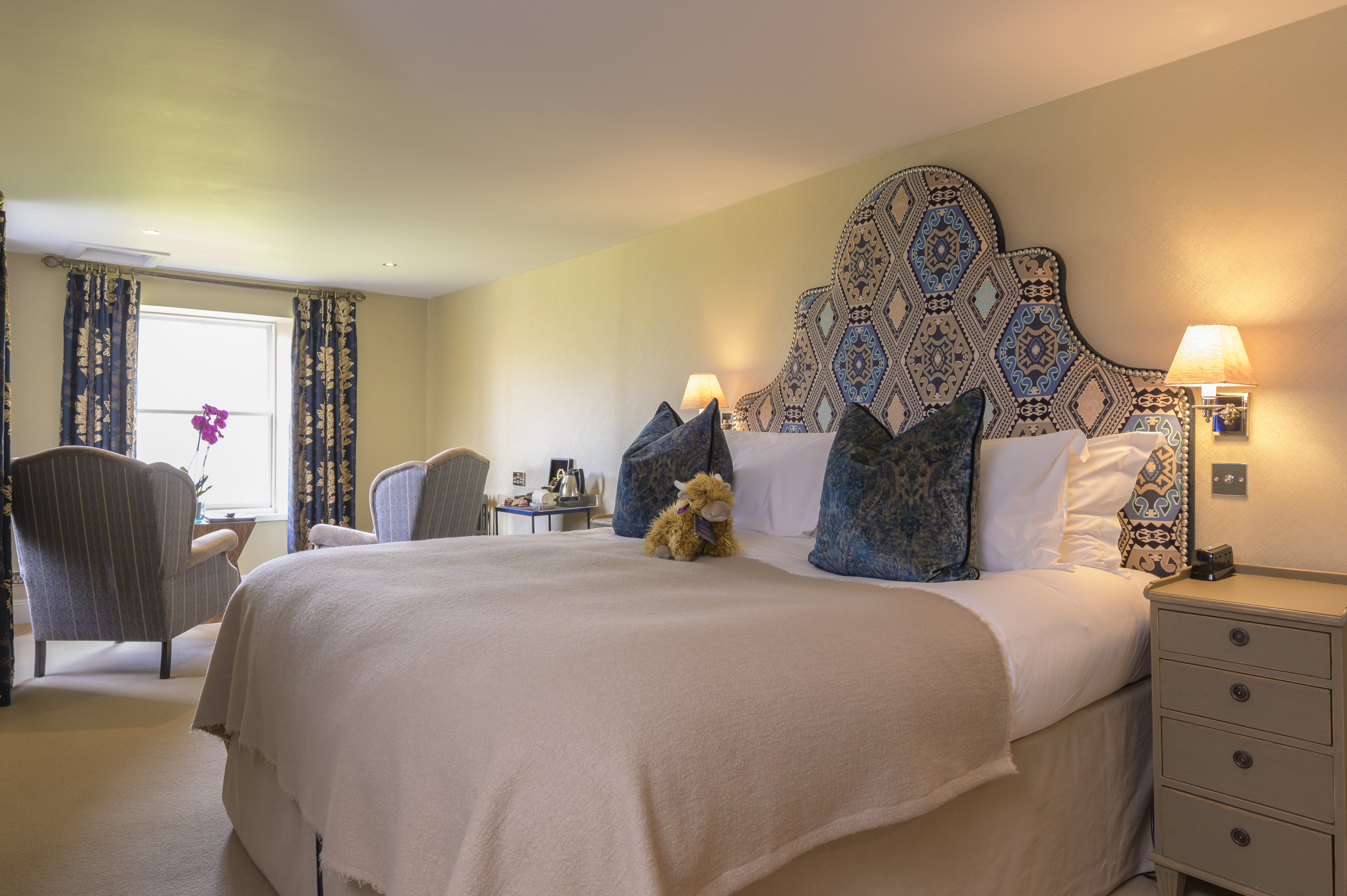 Stylish room at The Torridon with a blend of neutral modern decoration and rustic furnishings.