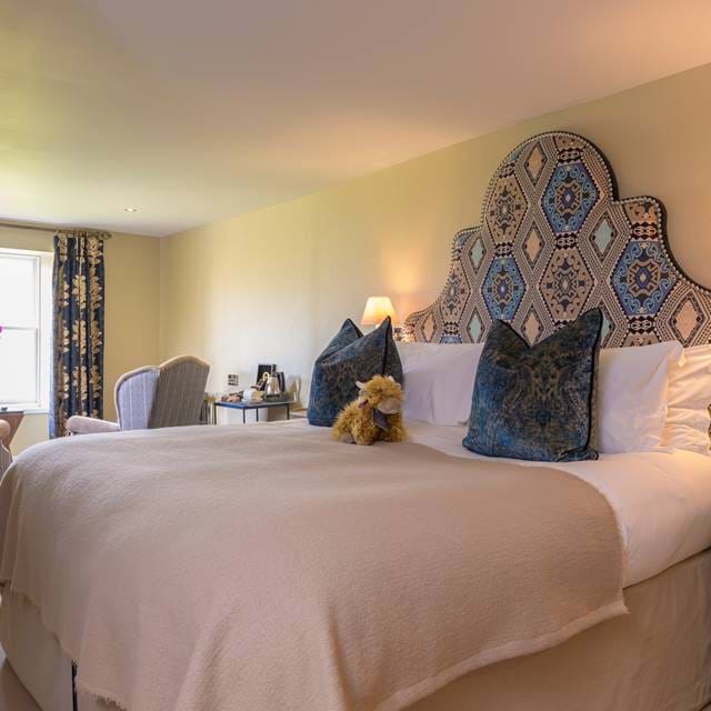 Stylish room at The Torridon with a blend of neutral modern decoration and rustic furnishings.