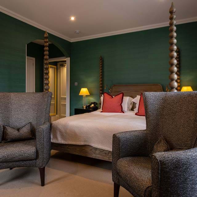 Interior of a stables room at The Torridon featuring soft lighting and a cosy aesthetic.